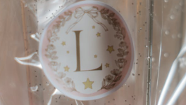L.
