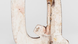 Q.