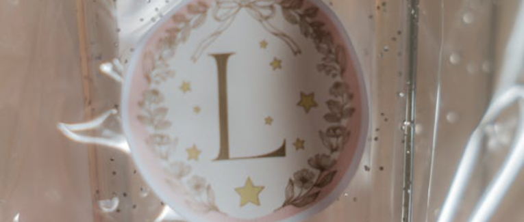 L.